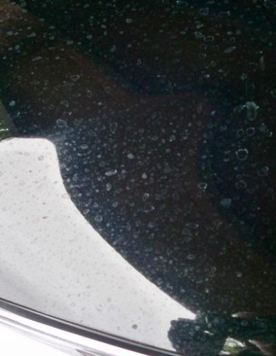 Close up of water spots on car