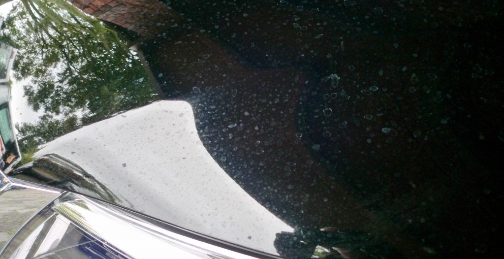 Close up of water spots on car