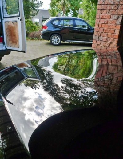 Reflections in bonnet after water spots removed