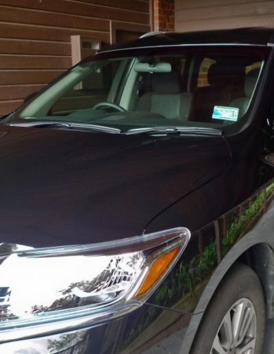 Car in garage after water spots removed