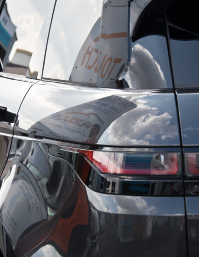 Reflections in paint on left rear quarter