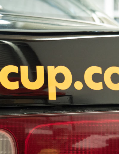 Close up 2Kcup.com sign writing