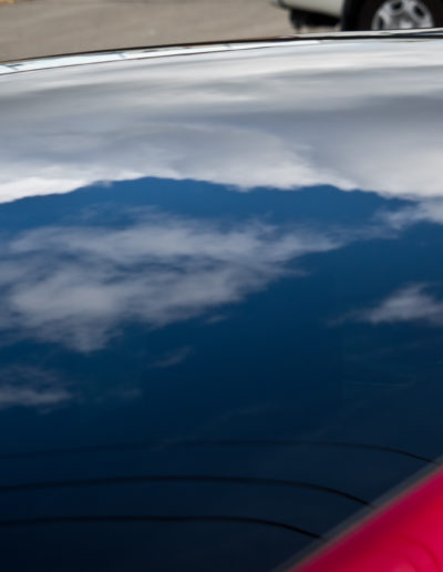 Clouds reflecting on roof