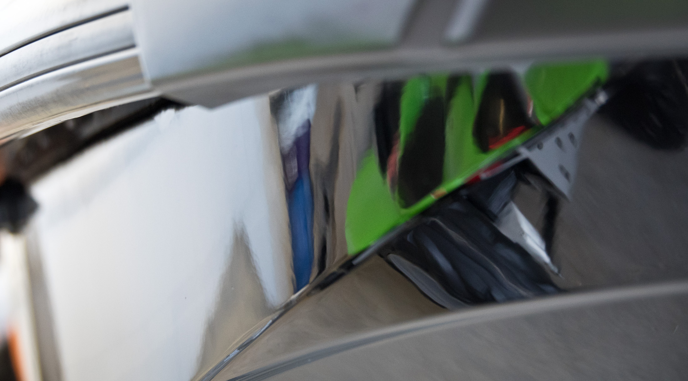 Reflection in bow of jet ski after coating applied