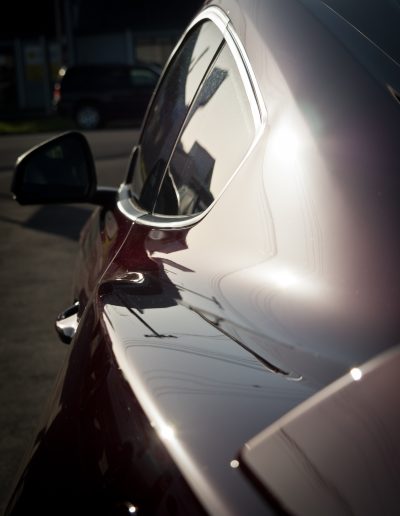 Sun setting on left rear quarter panel after coating applied