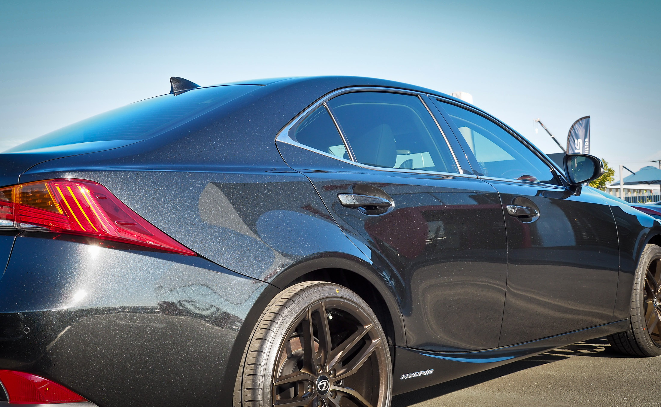 Left side rear view showing reflections in high gloss finish