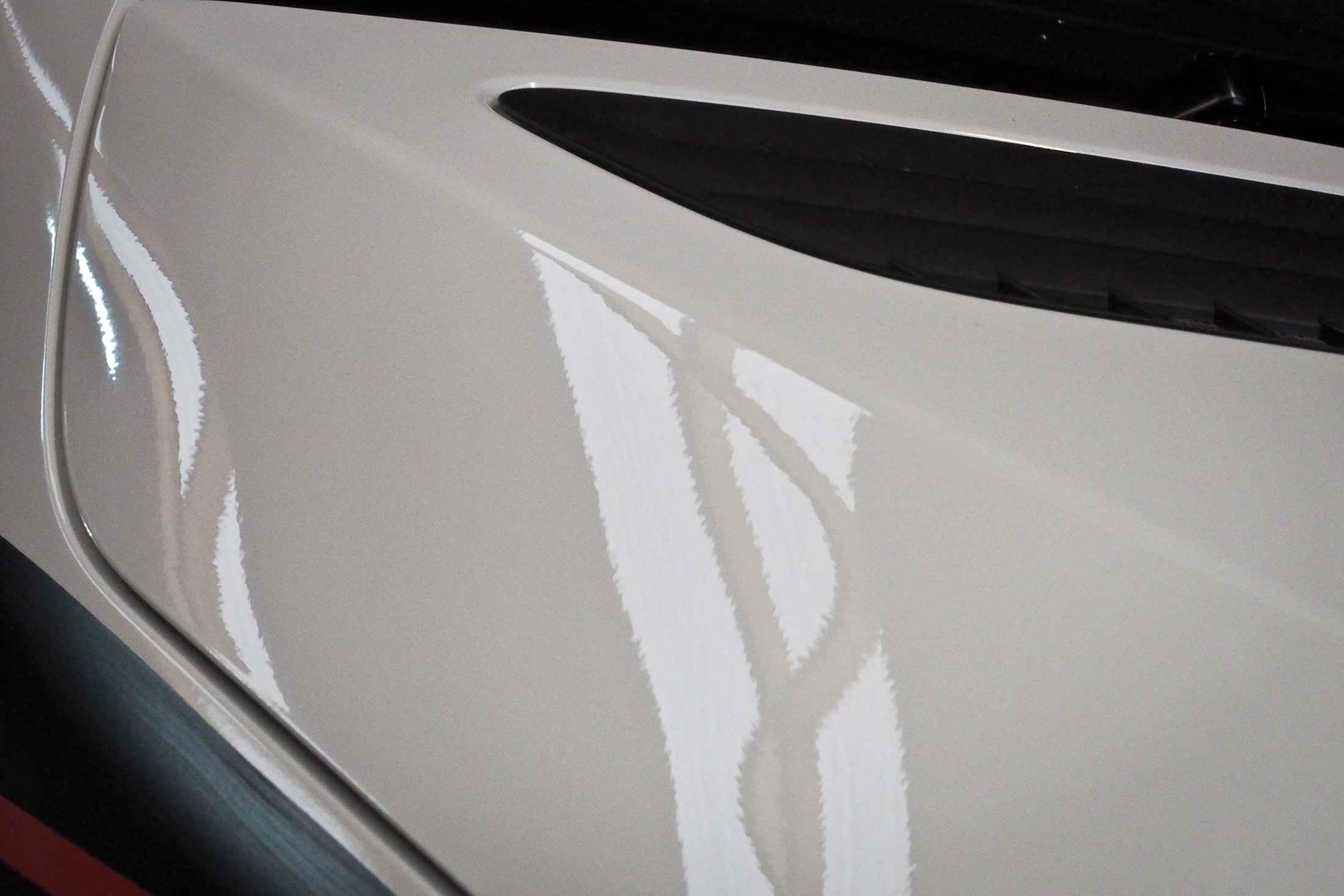 Close up of bonnet edge after coating applied