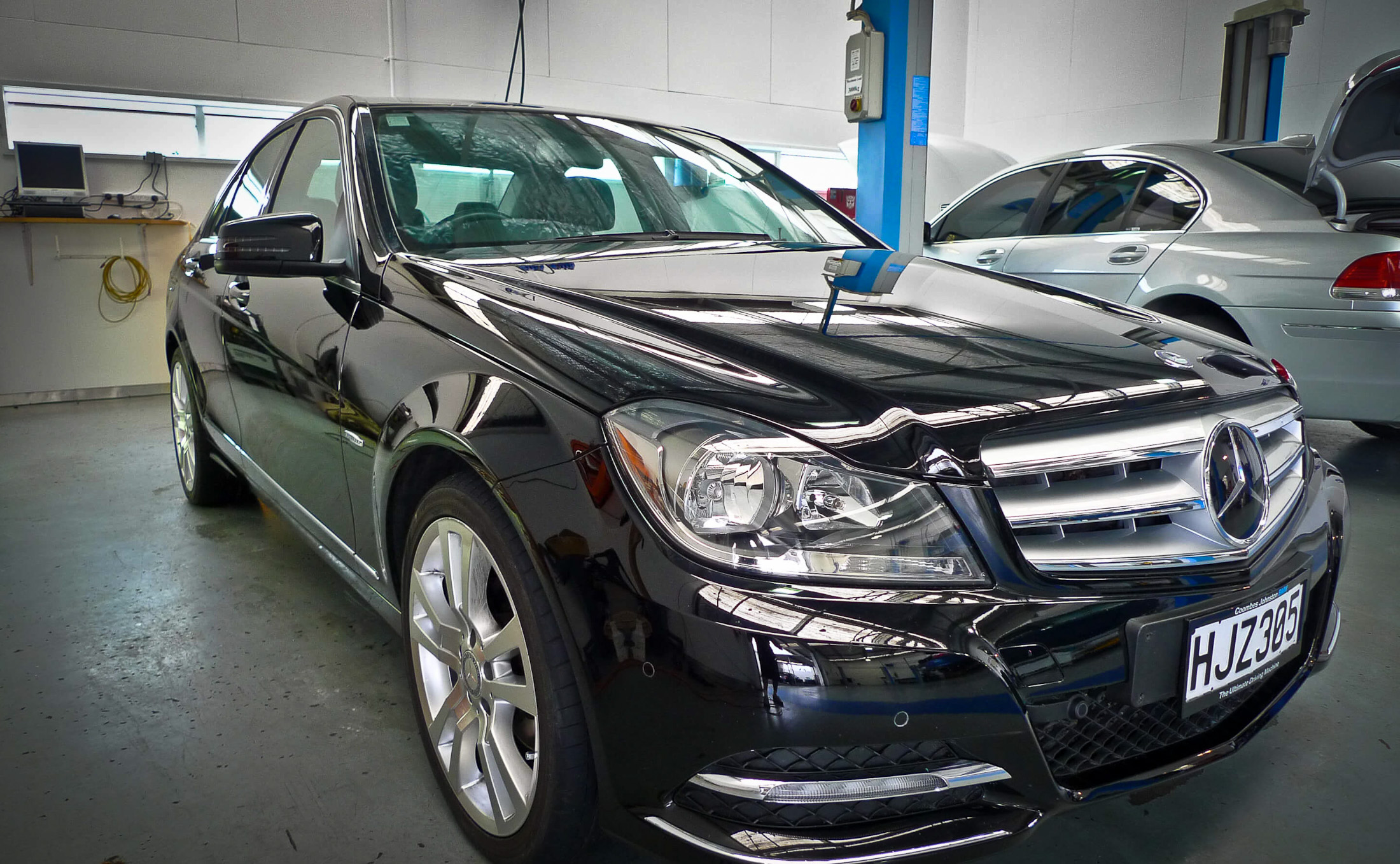 Black Mercedes paint detailing - deep rich black with paint reflections