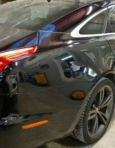 Rear and side view with reflections in the paintwork after coating applied
