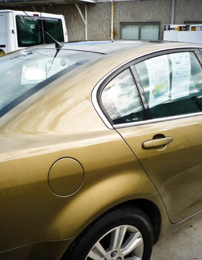 Deep gold paint with glossy surface after full reconditioning