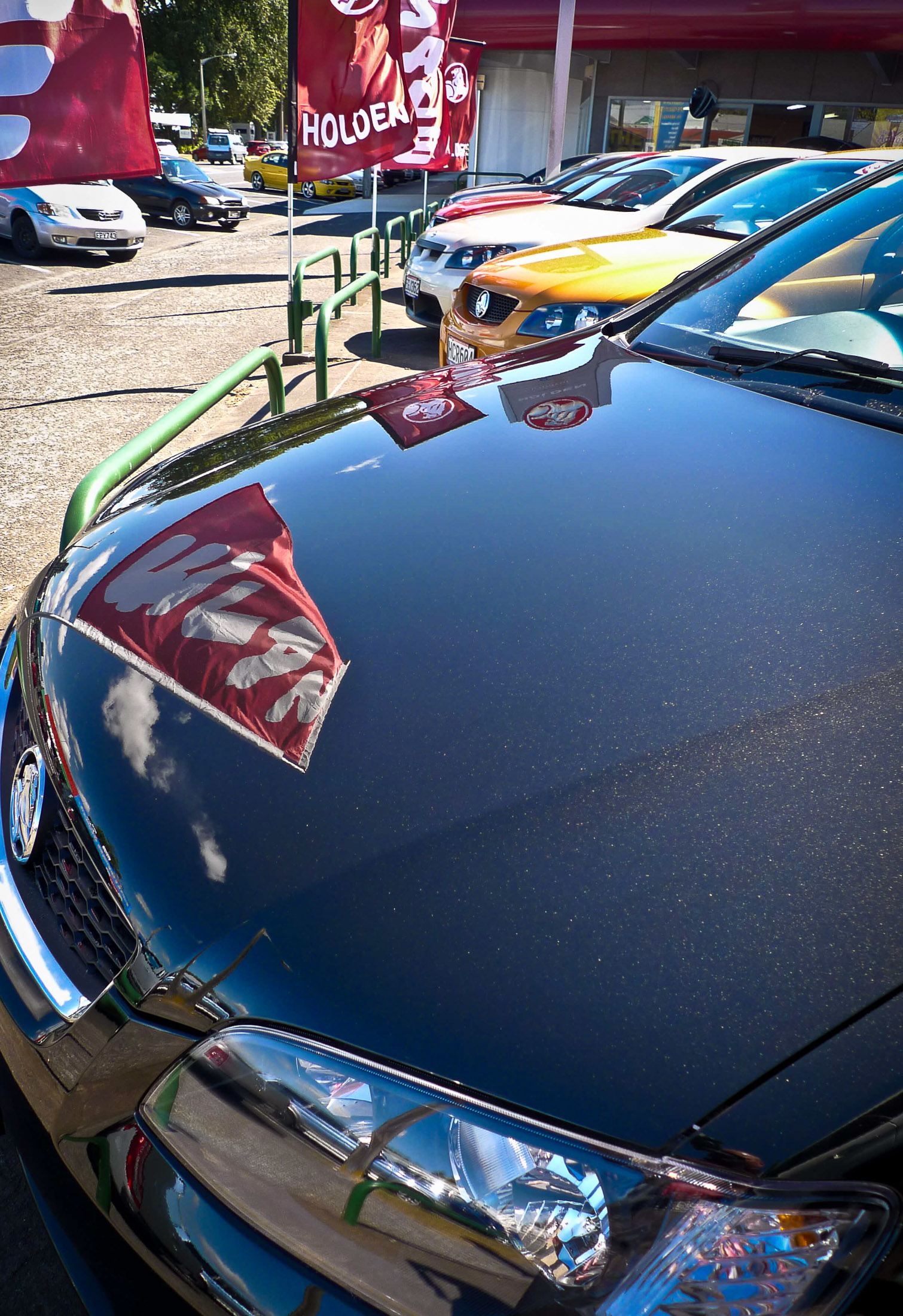 Flag reflecting on bonnet after water spots removed