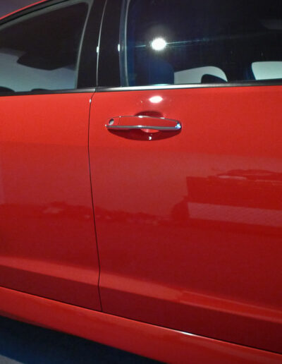 Right side of car after full paint surface detailing