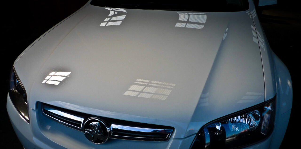 Automotive paint stone chips close up of repair process DuraSeal