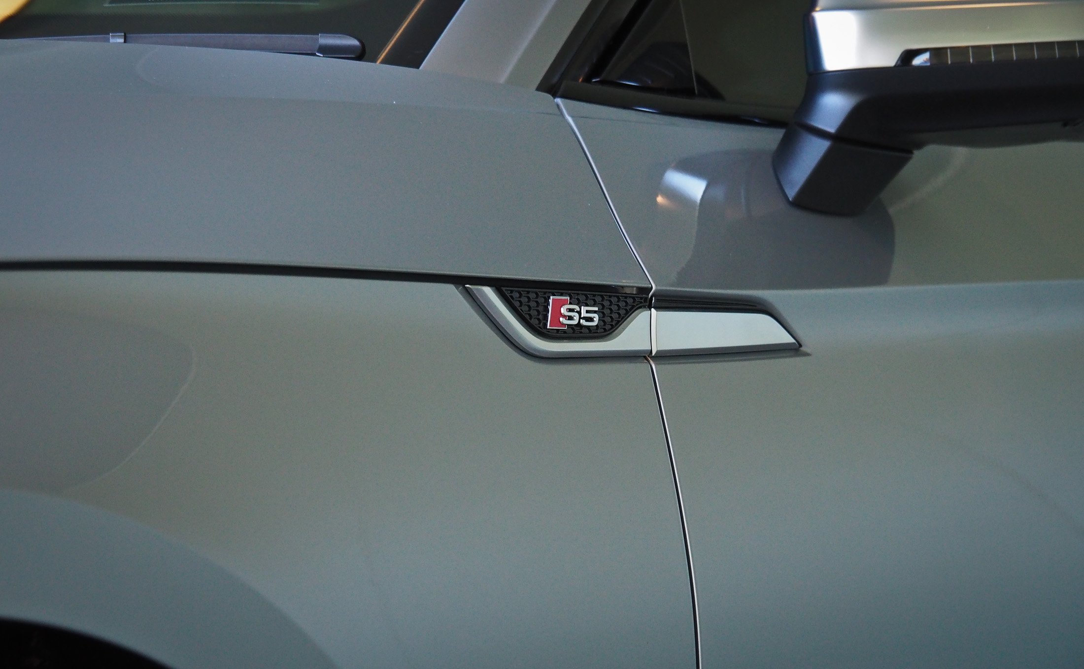 Close up of S5 side badge and reflections of door mirror