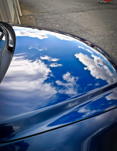 Clouds reflecting on bonnet