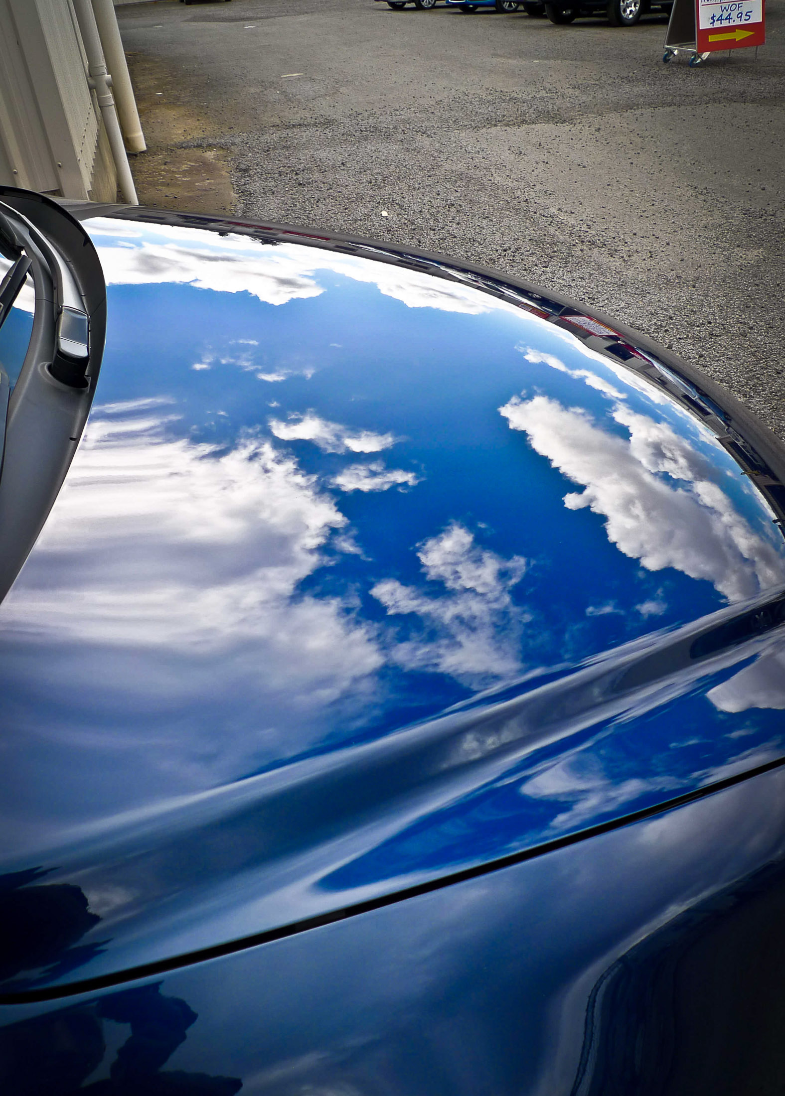 Clouds reflecting on bonnet