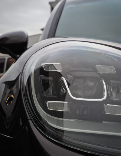 Close up of right front headlight with coating applied