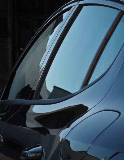 Left rear and doors looking forward with gloss and depth