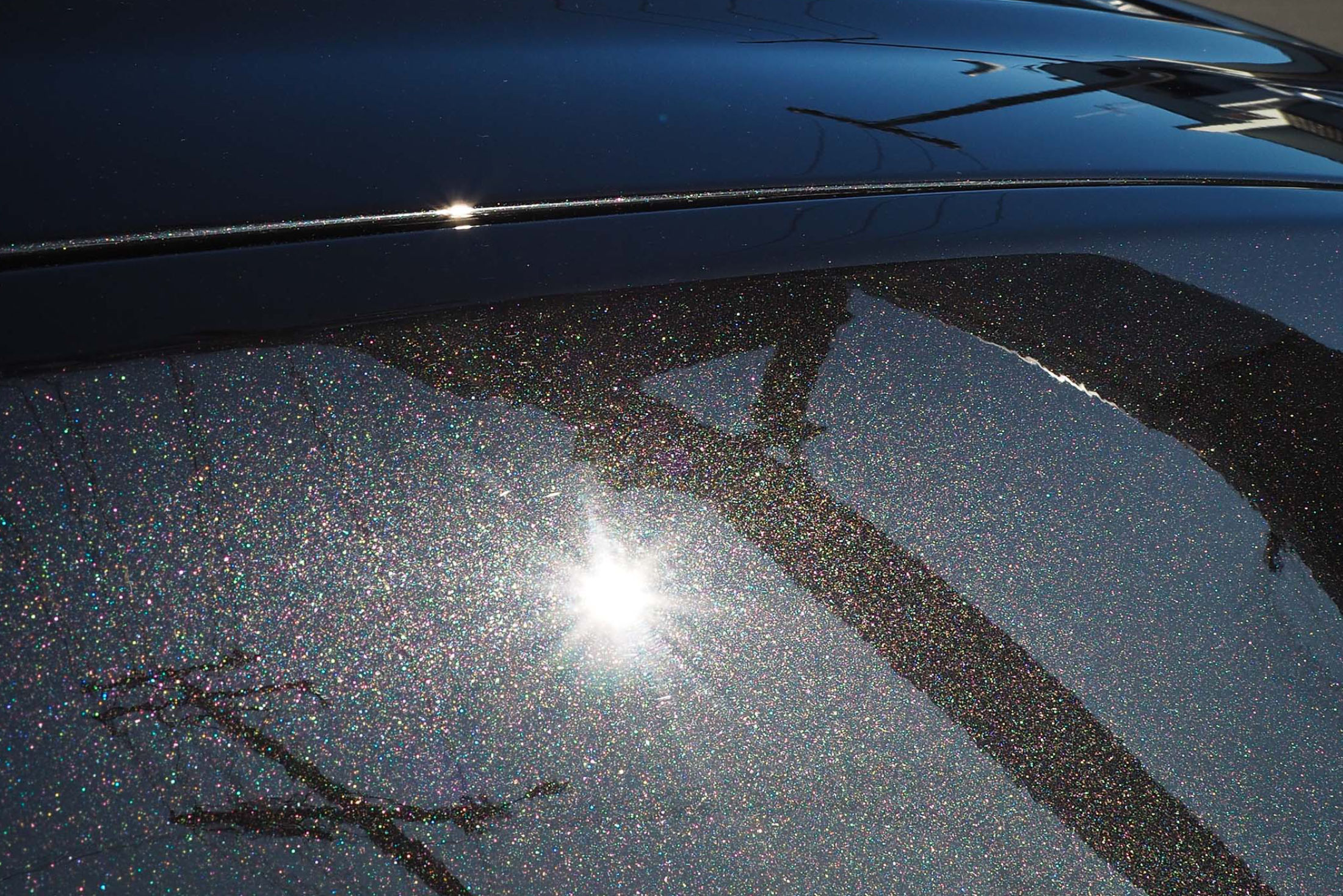 Removing excess coating from bonnet